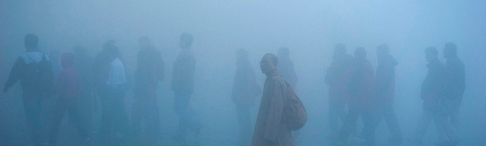 People walking in smog