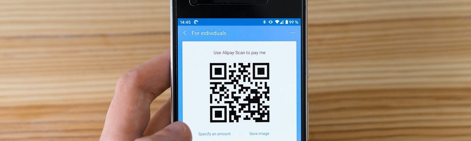 A user making payment through mobile payment app