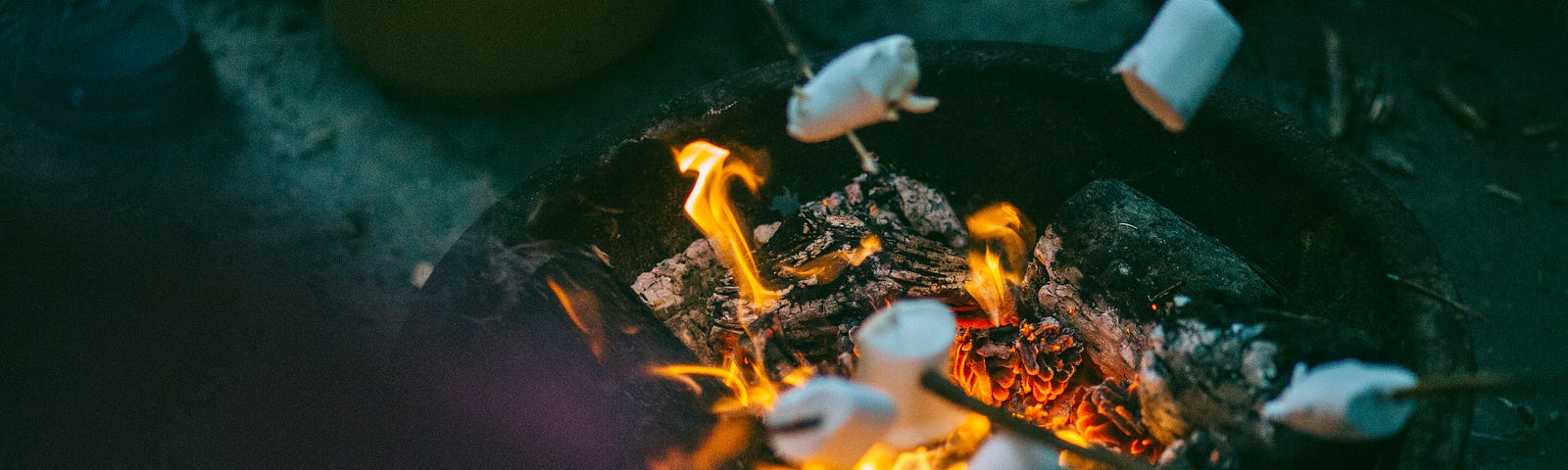 a campfire scene at summer camp