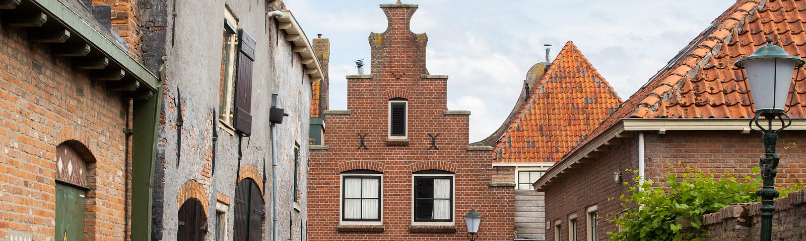 Pictured is a quaint town with old buildings in Holland.