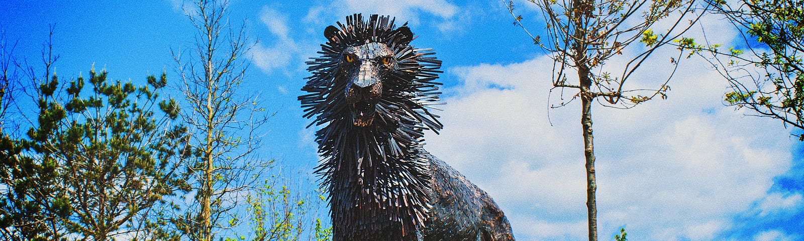 Statue of lion with mane like porcupine quills