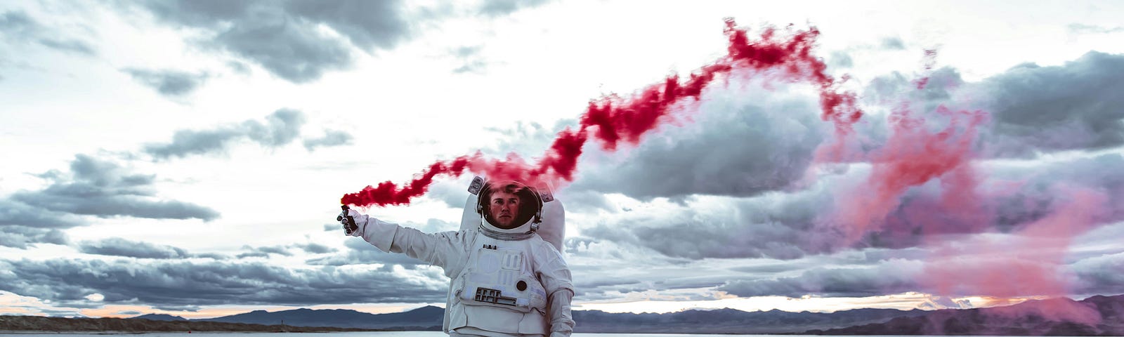 man in spacesuit holding a signal flare