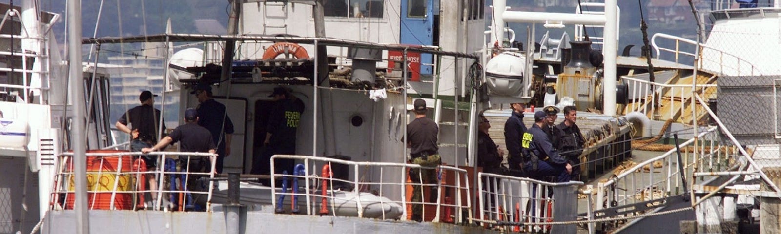 Australian authorities aboard a vessel involved in a A$400 million heroin raid in Sydney, Australia, October 15, 1998. Photo by Reuters Photographer/Reuters