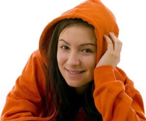 Girl wearing an orange hoodie