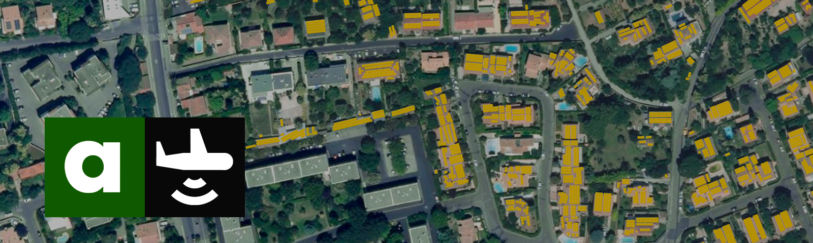 An aerial view of buildings’ roofs virtually covered with solar panels, in the south of France