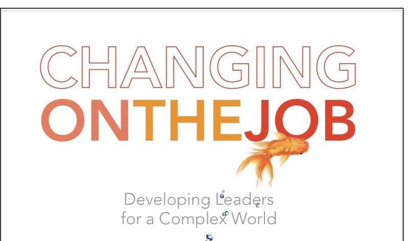 book cover for Changing on the Job