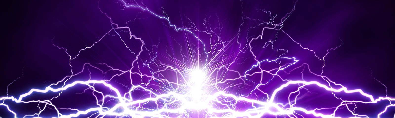 Brilliant purple lightning against a dark purple background. Depositphotos.