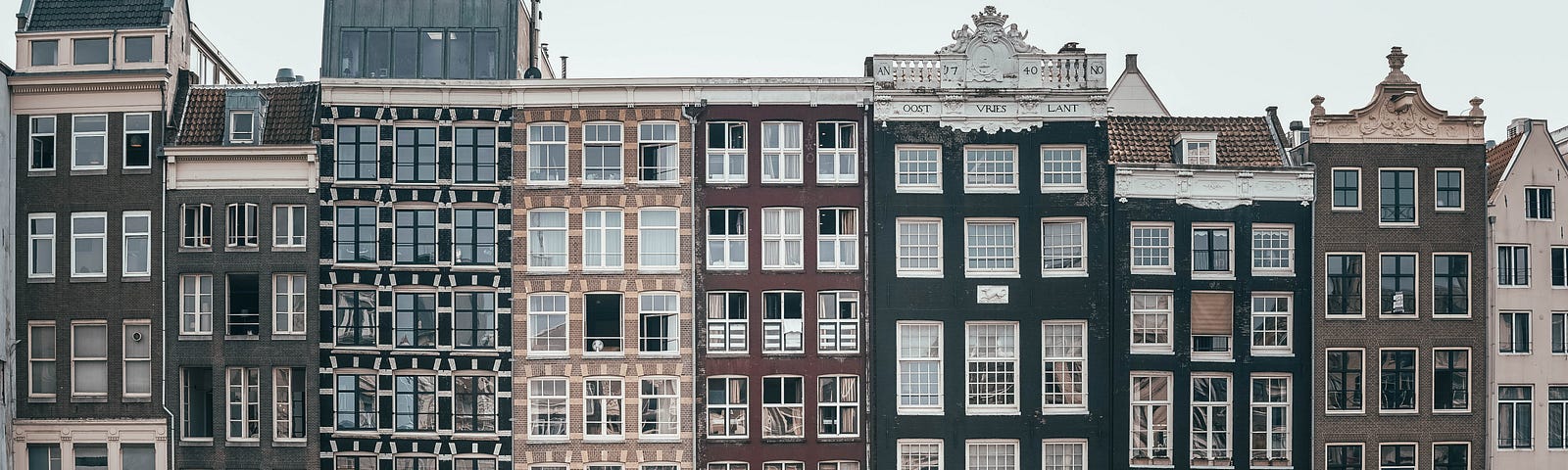 row houses of Amsterdam. Image Credits: Unsplash