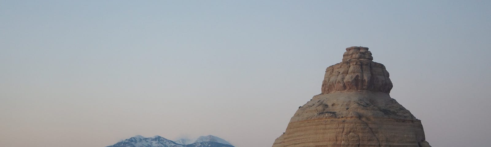 Large rock formation shaped like a boob