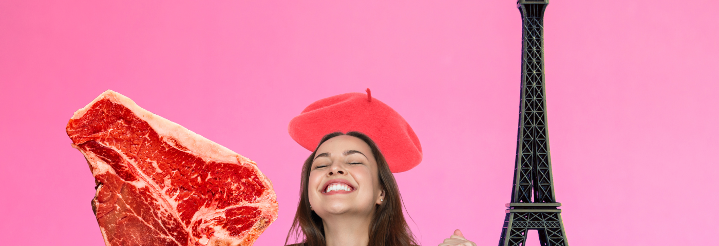 A lady in a beret in front of the Eiffel Tower holding a giant steak