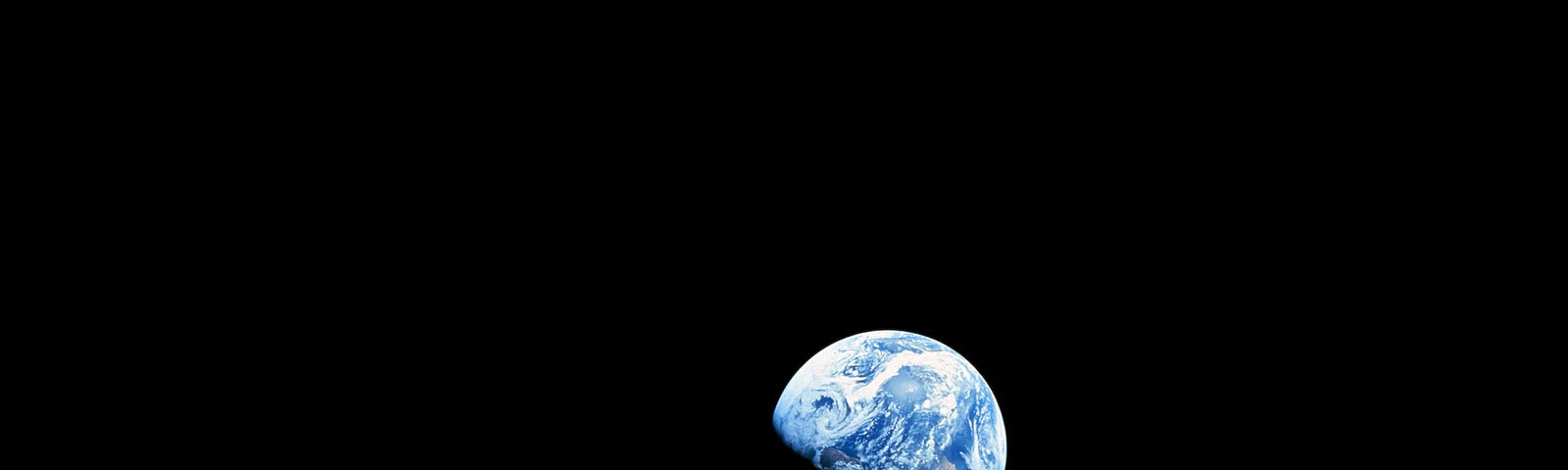 A photograph of Earth and some of the Moon’s surface that was taken from lunar orbit by astronaut William Anders on December 24, 1968, during the Apollo 8 mission.