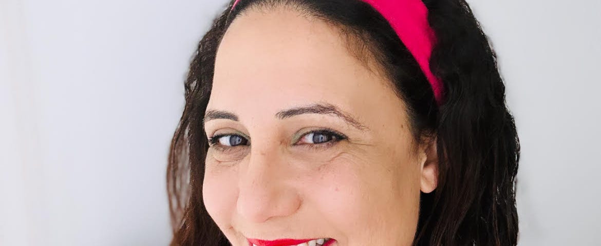 A smiling selfie of the writer.