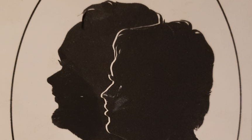 This image shows me and my wife in outline form.