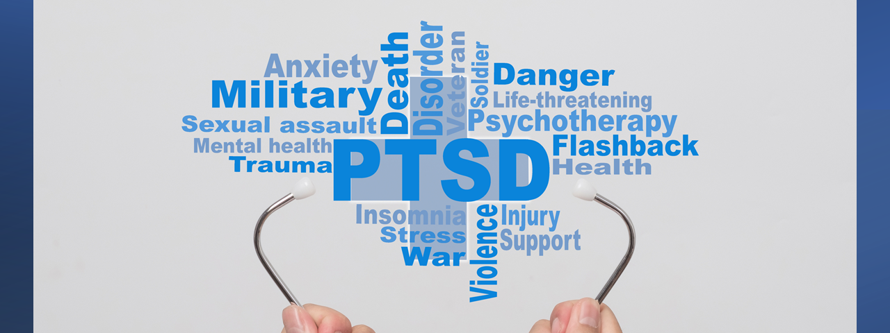 Doctor hands holding a stethoscope and PTSD — post traumatic stress disorder words on gray background.