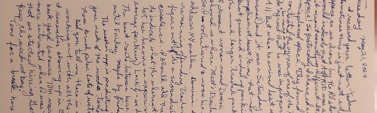 Photo of a page, turned sideways, of handwritten script — the actual letter that is transcribed in the post. It is blue ink on white paper. Photo by author using a cellphone.