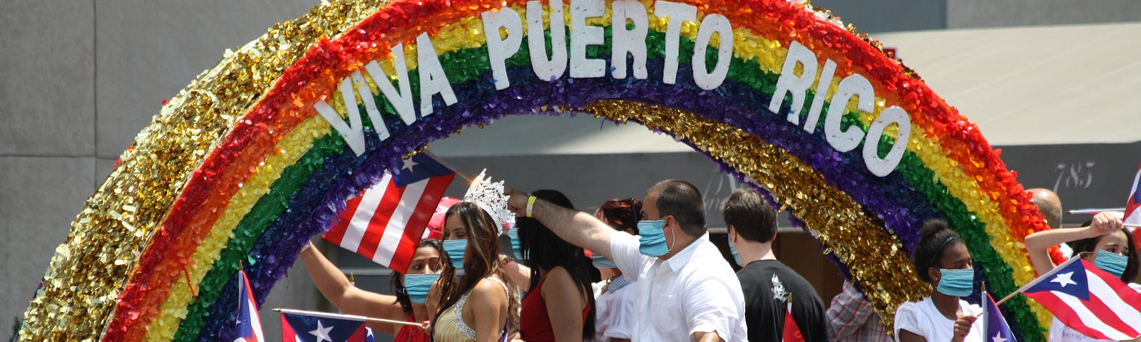 Puerto Rican Festival with celebrants in surgeon’s masks.