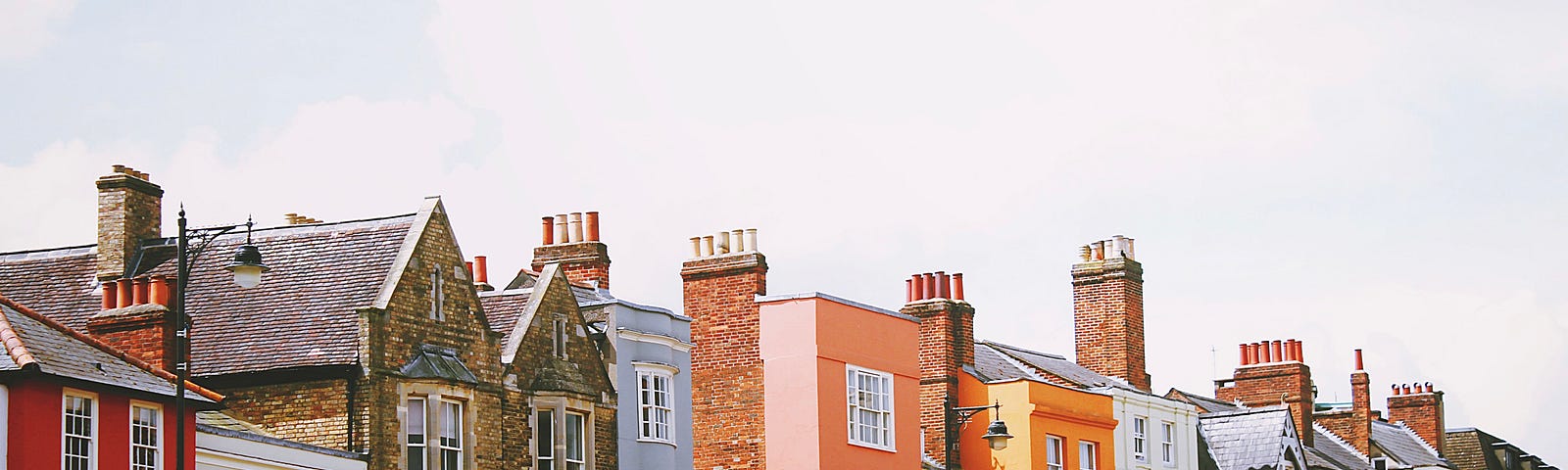 a row of different colored houses