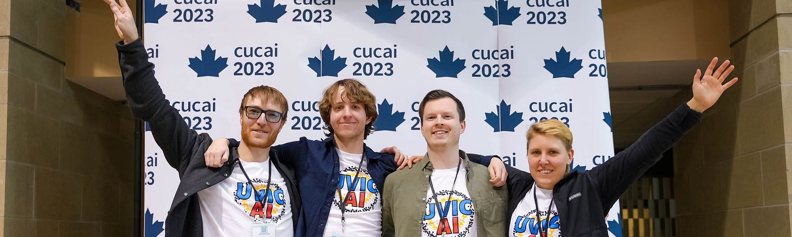 “UVic AI members at the Canadian Undergraduate Conference on AI in Kingston. From left to right: Leo Mckee-Reid, Nathan Woloshyn, Eric Showers, and Dana Bell”.