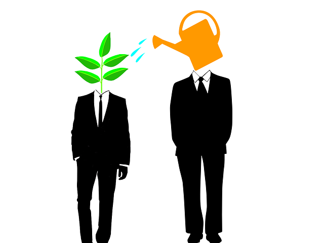 Cartoon character of one man watering the other man representing mentorship.