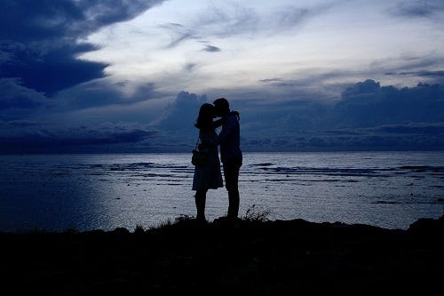 Couple — sunset — silhouette