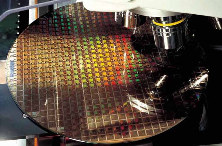 IMAGE: A silicon wafer under the microscope in a TSMC manufacturing plant