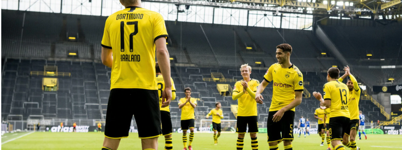 Erling Haaland’s ‘socially distanced’ celebration in Dortmund’s 4–0 win over Schalke as Bundesliga restarts