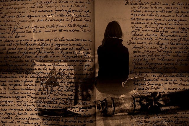 Photo of a handwritten manuscript overlaying the figure of a woman sitting down