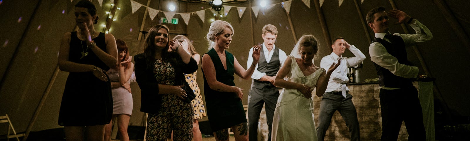 Image of a bridal party dancing.