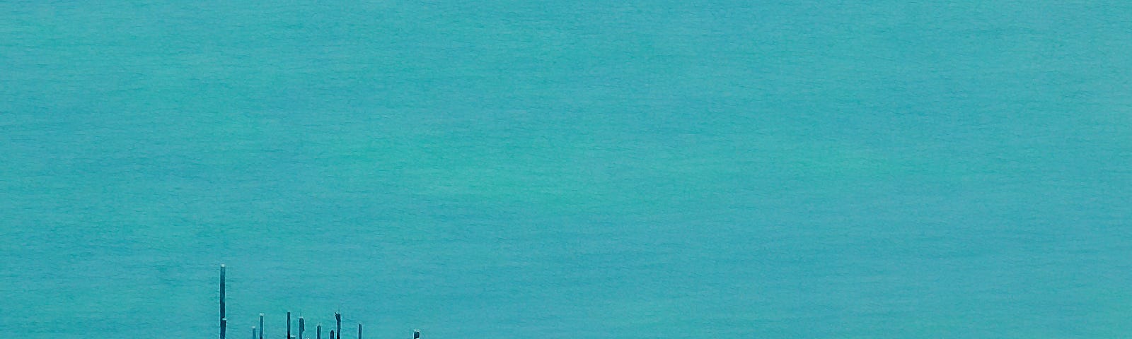 inaccessible old wooden pier in turquoise blue waters, love story, soulmates, death | © pockett dessert, love’s edge