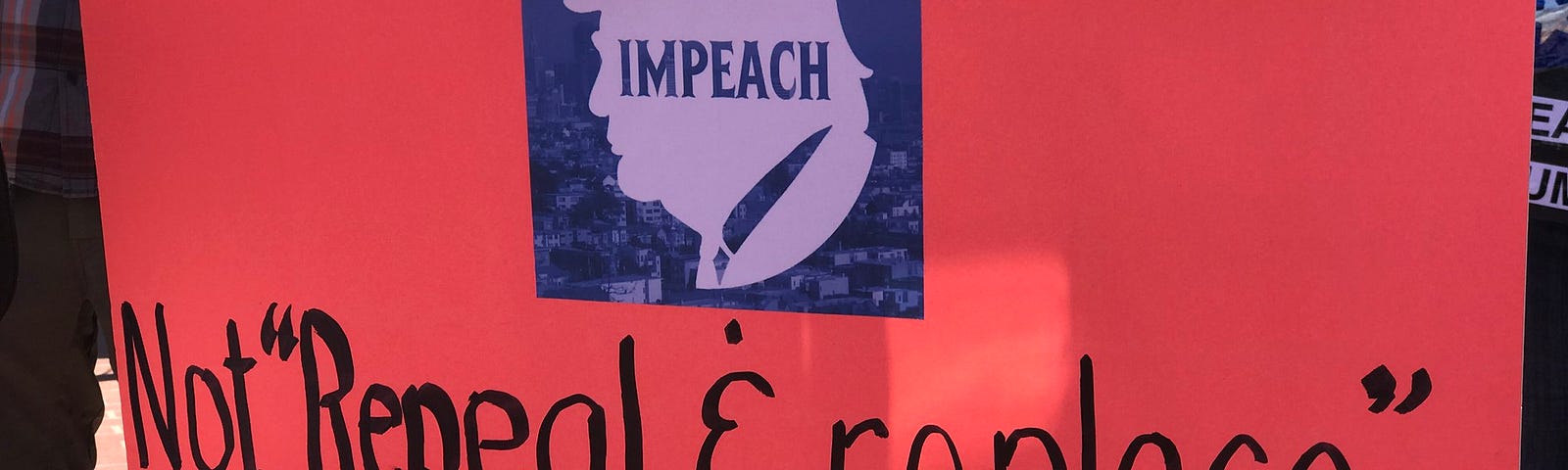 Cardboard sign that has an silouette of Trump and the words: Not “repeal & replace” — Impeach and Convict!