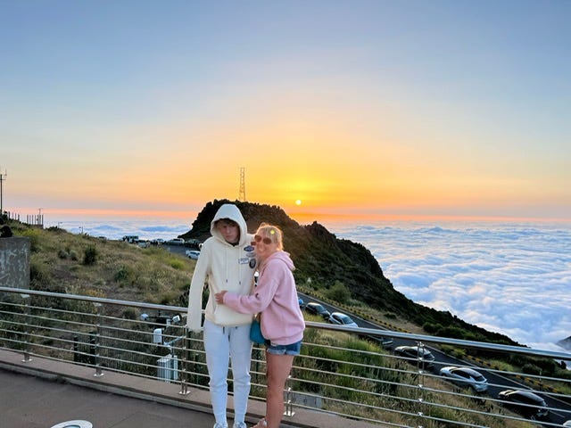 Photo of my son and I at the top of mountain