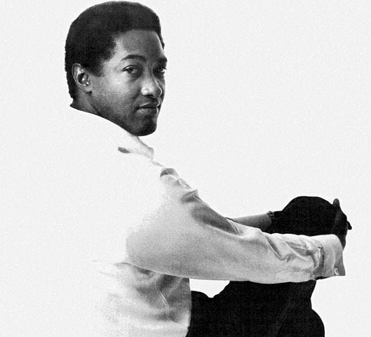 Black and white photo of soul singer Sam Cooke, a young Black man.