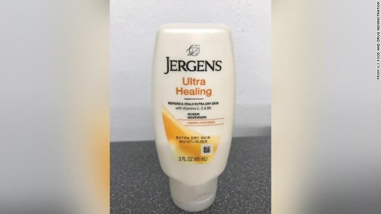 A 3 fluid ounce bottle of JERGENS Ultra Healing Moisturizing lotion stands on end.