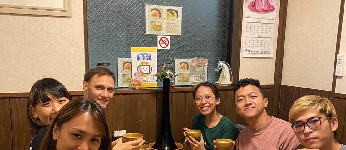 The ETA team minus Naomi posing while holding our Makgeolli drink for Dinner