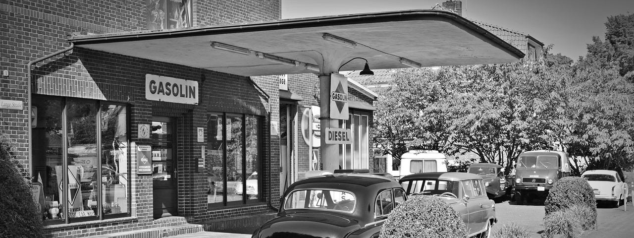 IMAGE: A photo of an old petrol station in black and white