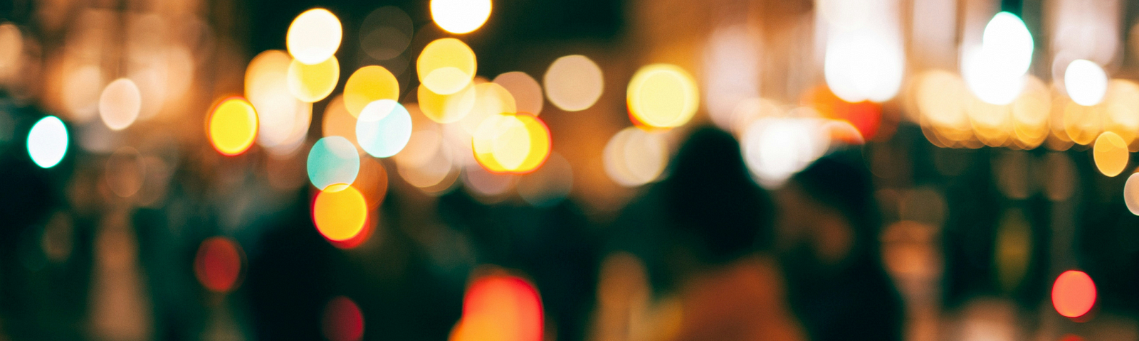 Image of blurred people on a busy street