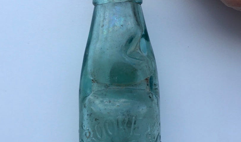 A full-length picture of the codd-neck bottle