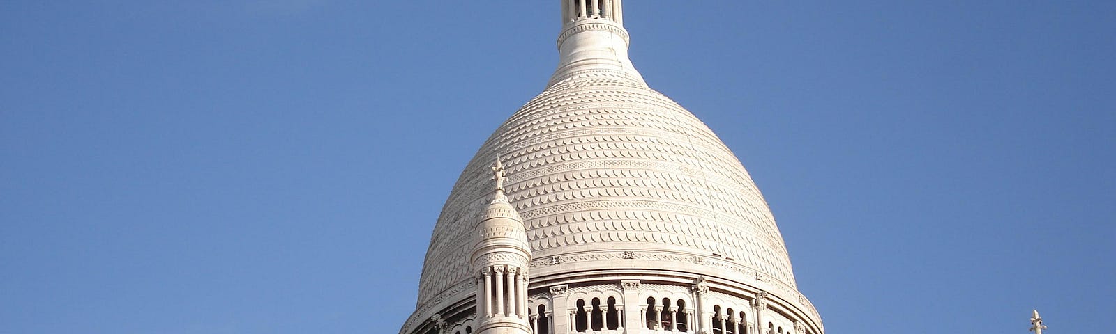 Domes of the Sacré Coeur in Paris, as an illustration for the song La Complainte de la Butte.