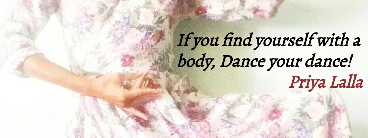 Me wearing a white dress with purple flowers doing a dance pose and my quote saying “If you find yourself with a body, dance your dance!”