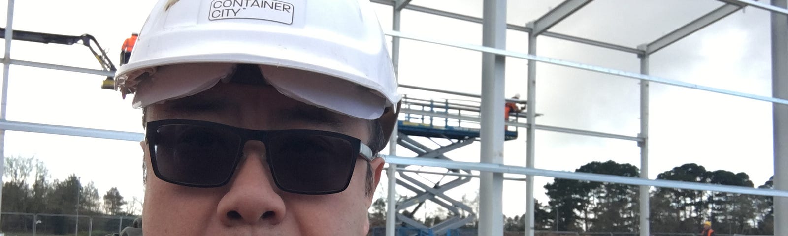 Gordon Fong wearing a hard hat