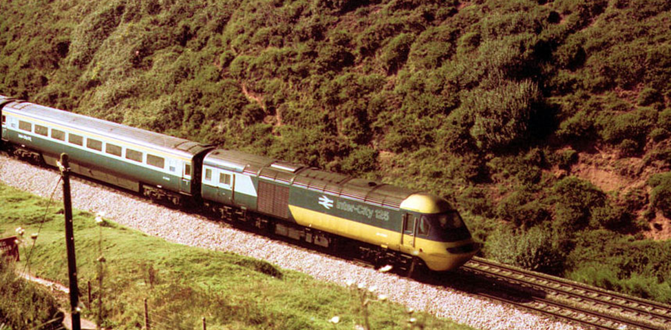 The InterCity 125, the current confirmed record holder as the fastest diesel-powered train at 148 mph (238 km/h); is made up of two power cars, one at each end of a fixed formation of carriages; capable of 125 mph (201 km/h) in regular service. Author Mike Powell, This file is licensed under the Creative Commons Attribution-Share Alike 2.0 Generic license. File:Dawlish Warren 1970s — 5.jpg — Wikimedia Commons