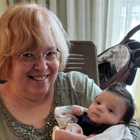 Paula Shablo with her grandchild, allowed to visit by baby’s father holding child captive from baby’s mother — Paula’s daughter.