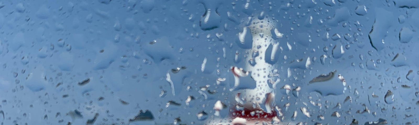 Macinnow Island lighthouse obfuscated by droplets of water