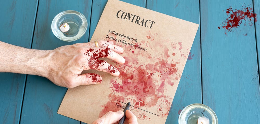 Bloody hands writing a sheet saying contract