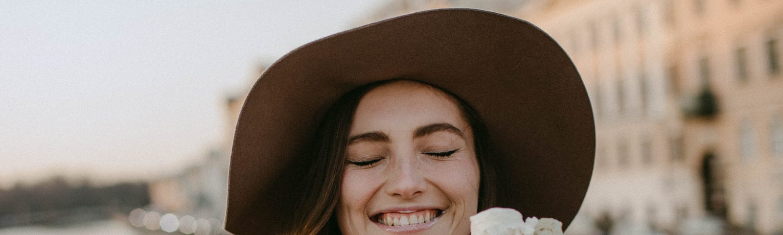 A happy woman who seem to have won a challenge.