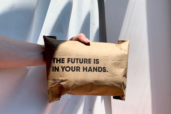 A paper-package with the text “The Future is in your hands”