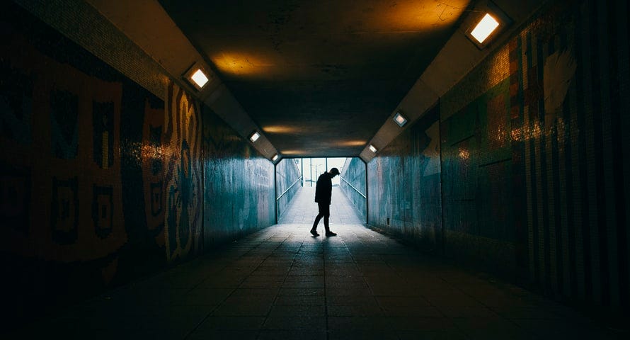 lonely man in an underpass