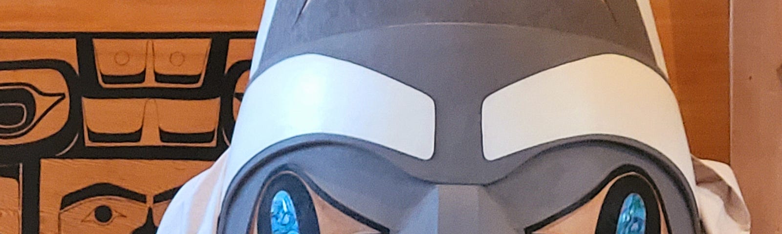 A white and grey mask for traditional Haida ceremonies