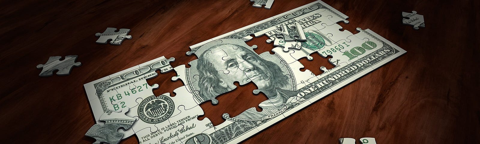 The image shows a 100 dollar bill jigsaw puzzle