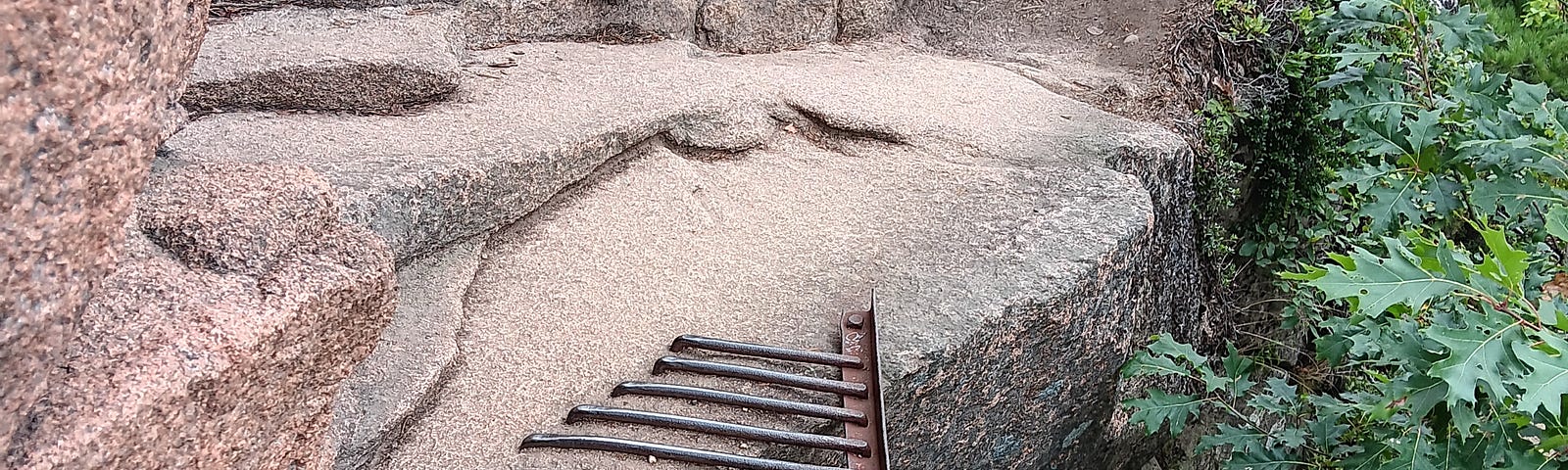 A section of the Beehive Loop trail which has a steel grate to extend the trail outward, allowing you to walk along the edge. There is no railing to prevent falling.